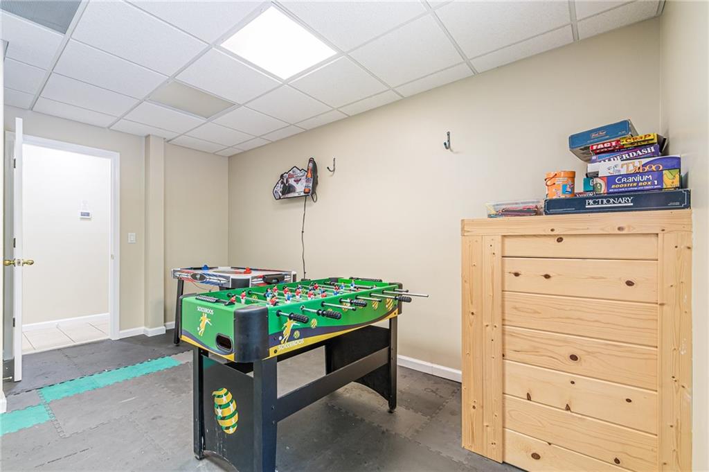 45 Chestatee River Ridge Dahlonega, GA 30533 - Photo 22 of 74 a room with painting on the wall and a dresser