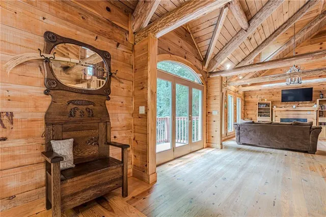 a kitchen with stainless steel appliances a stove a sink and a microwave