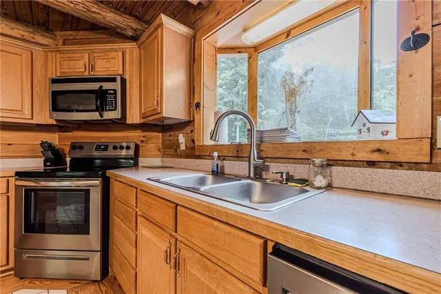 a bathroom with a sink and a bathtub