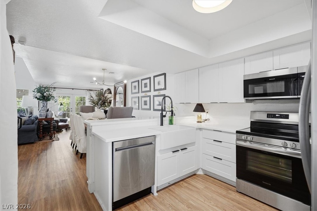 6250 West Flamingo Road, Unit 93 Las Vegas, NV 89103 - Photo 1 of 38 This bright kitchen offers a sleek design, ample counter space, and integrated appliances.