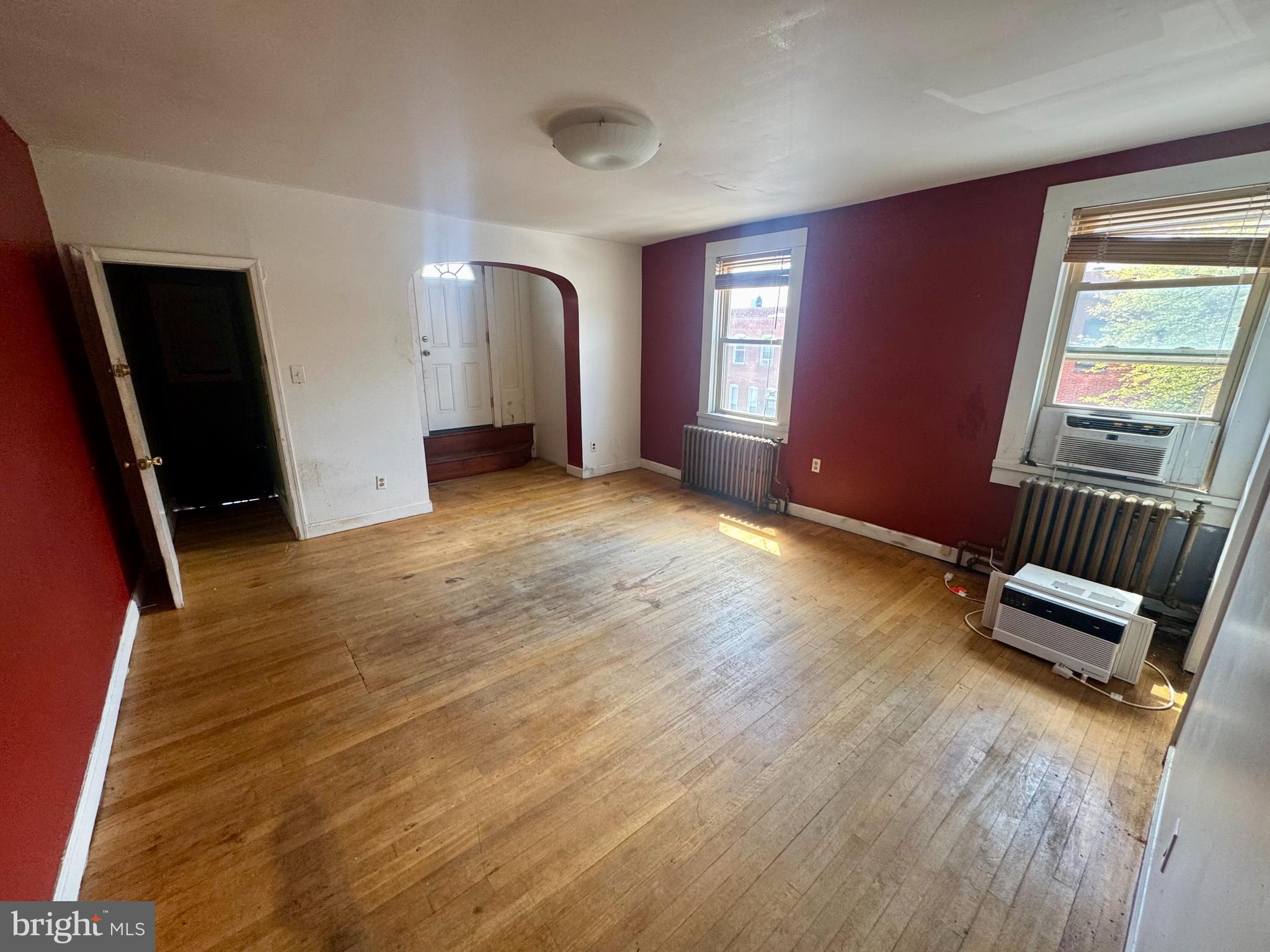 3301 Foster Avenue Baltimore, MD 21224 - Photo 14 of 19 a view of an empty room with glass door and furniture