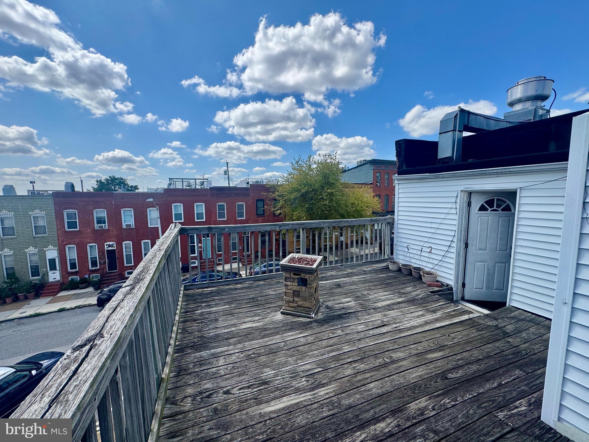 3301 Foster Avenue Baltimore, MD 21224 - Photo 16 of 19 a view of a roof deck with couches