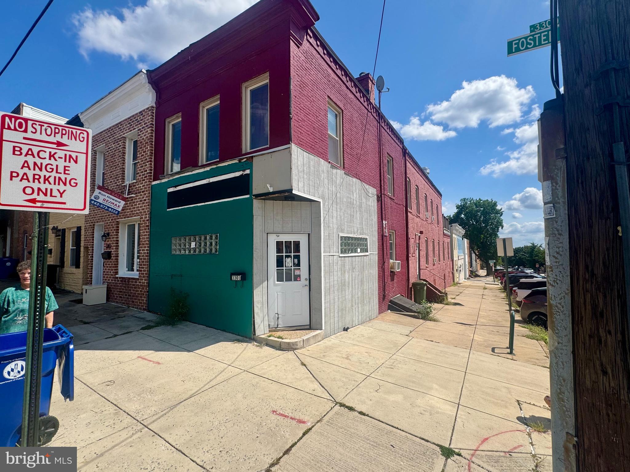 3301 Foster Avenue Baltimore, MD 21224 - Photo 2 of 19 a view of a building with a tree