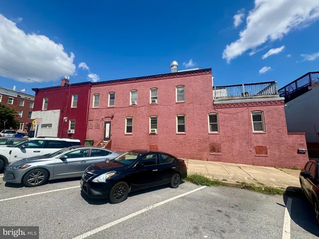 a car parked in front of a house