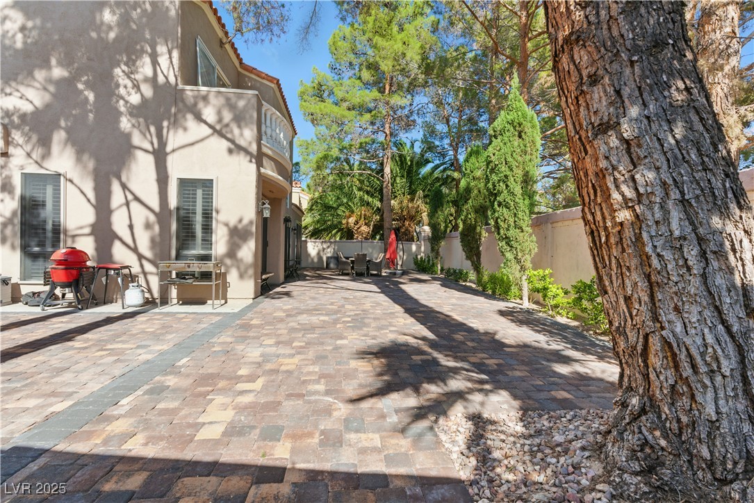 8215 Crow Valley Lane Las Vegas, NV 89113 - Photo 11 of 43 View of decorative driveway