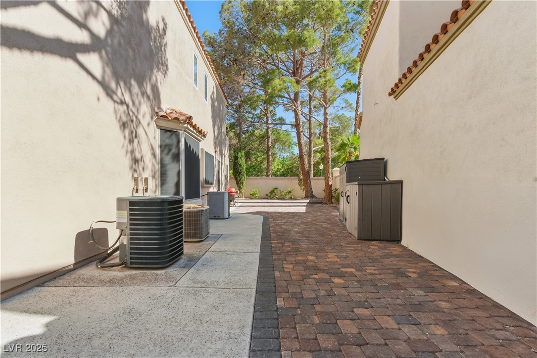 8215 Crow Valley Lane Las Vegas, NV 89113 - Photo 40 of 43 Fenced backyard with a patio area