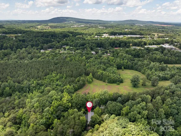 a view of a city with mountains in the background