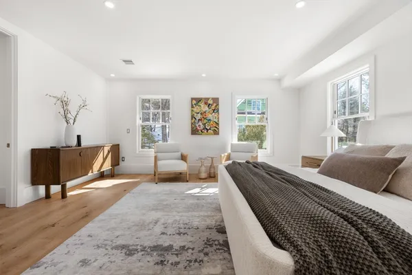 a bedroom with furniture and a couch