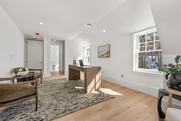 a bathroom with a double vanity sink toilet and shower