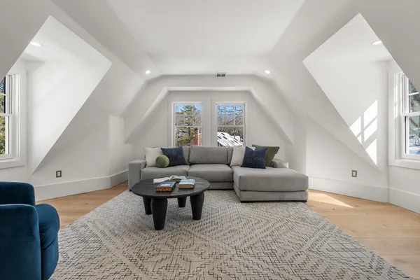 a living room with furniture and a couch