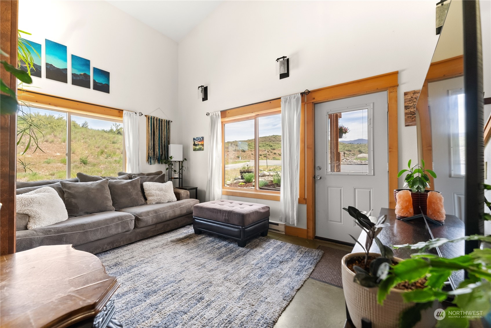 33 West Chewuch Road Winthrop, WA 98862 - Photo 12 of 33 a living room with furniture and a large window