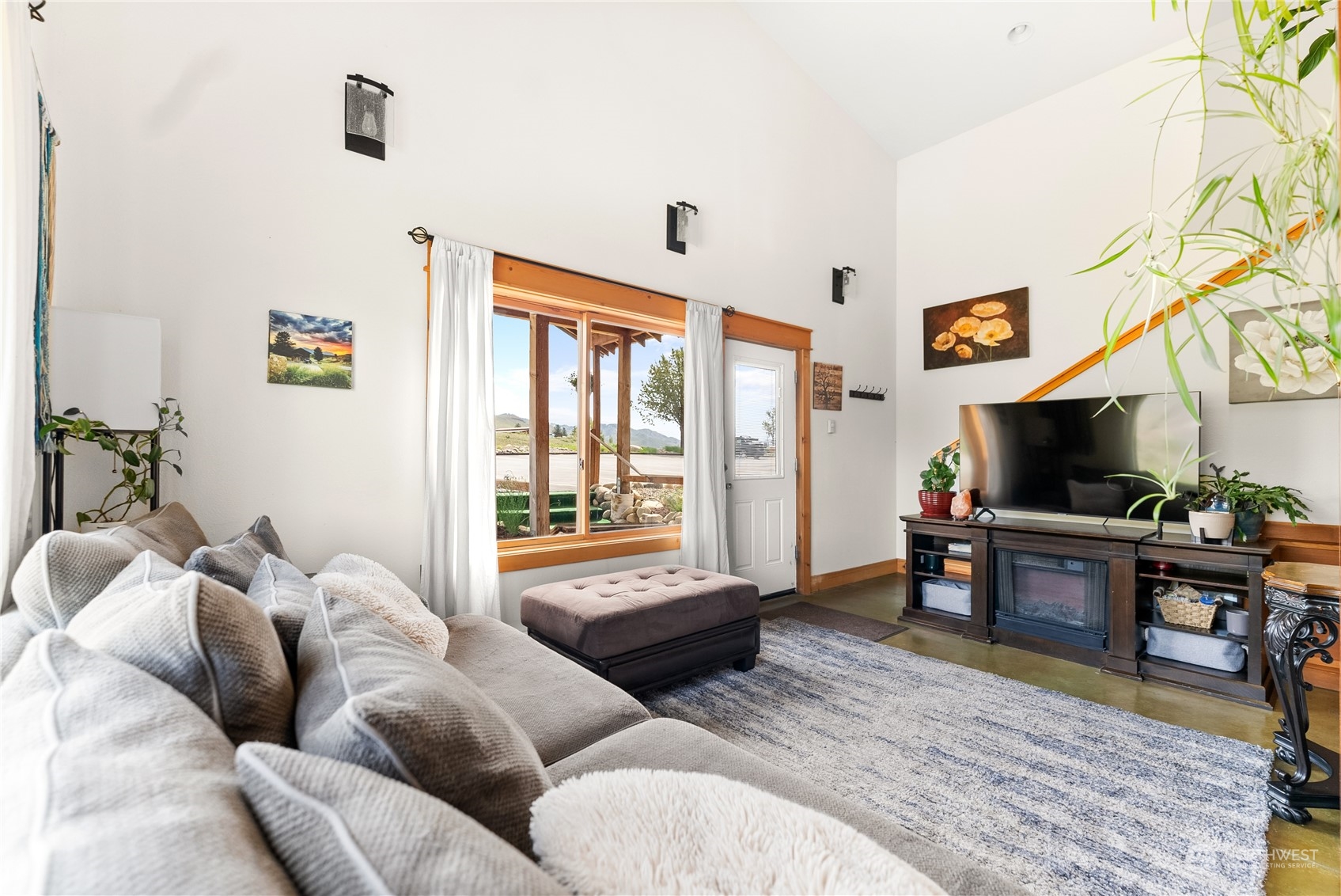 33 West Chewuch Road Winthrop, WA 98862 - Photo 13 of 33 a living room with furniture and a flat screen tv
