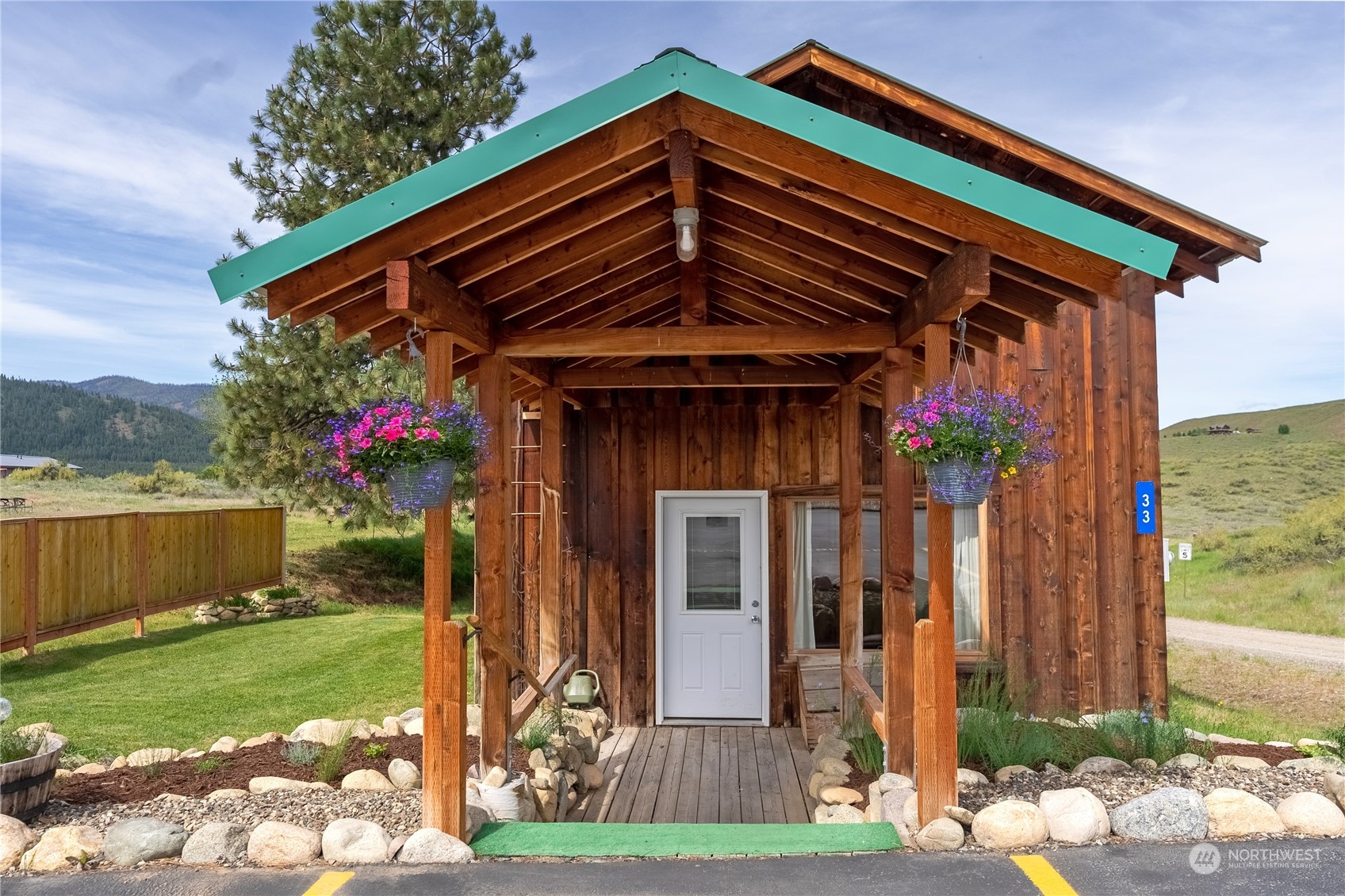 33 West Chewuch Road Winthrop, WA 98862 - Photo 2 of 33 a front view of a house with garden