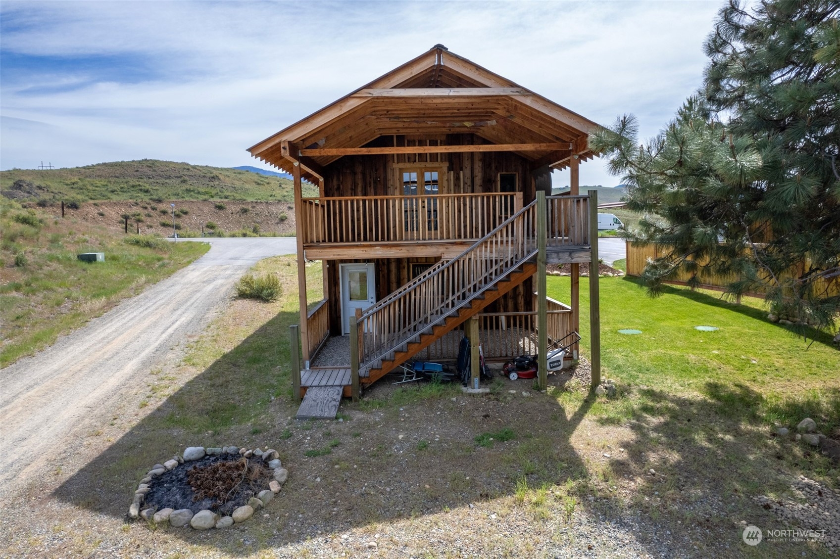 33 West Chewuch Road Winthrop, WA 98862 - Photo 26 of 33 a view of a wooden deck with a yard