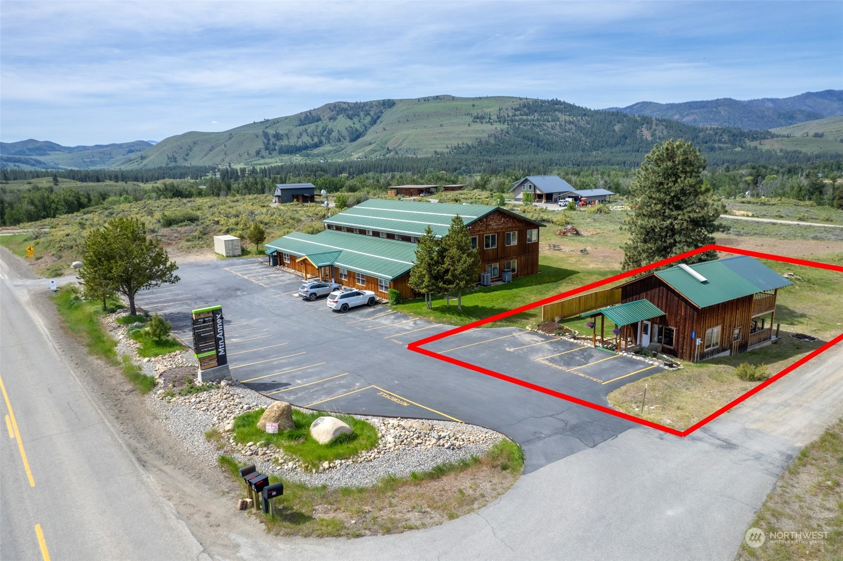 33 West Chewuch Road Winthrop, WA 98862 - Photo 32 of 33 an aerial view of a house a yard and mountain