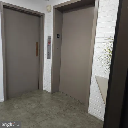 a view of a hallway to a house
