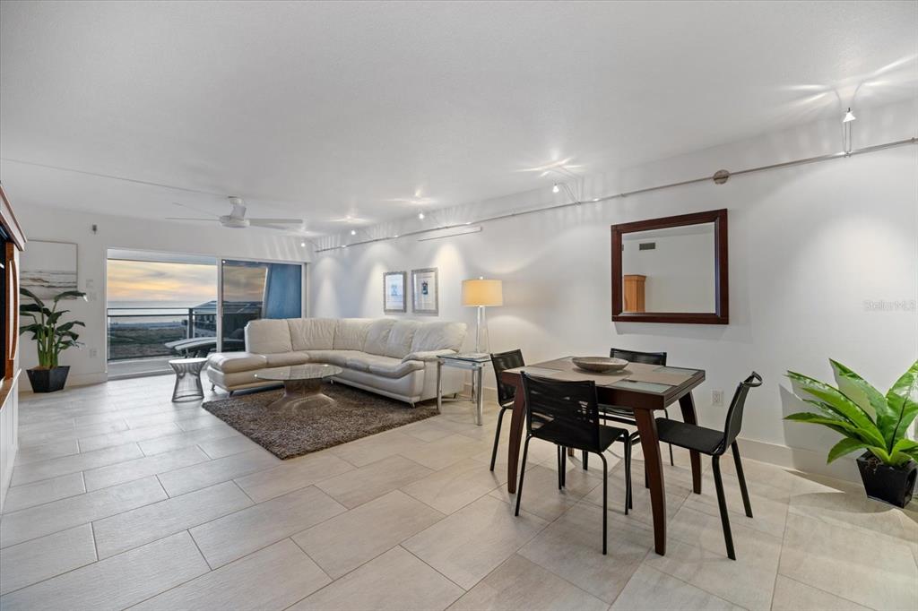 625 Beach Road, Unit 602 Sarasota, FL 34242 - Photo 18 of 65 a living room with furniture and wooden floor