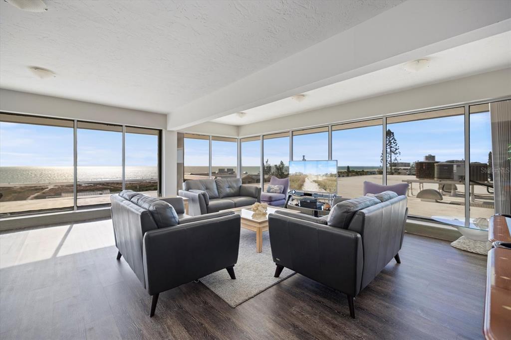 625 Beach Road, Unit 602 Sarasota, FL 34242 - Photo 52 of 65 a living room with furniture and a large window