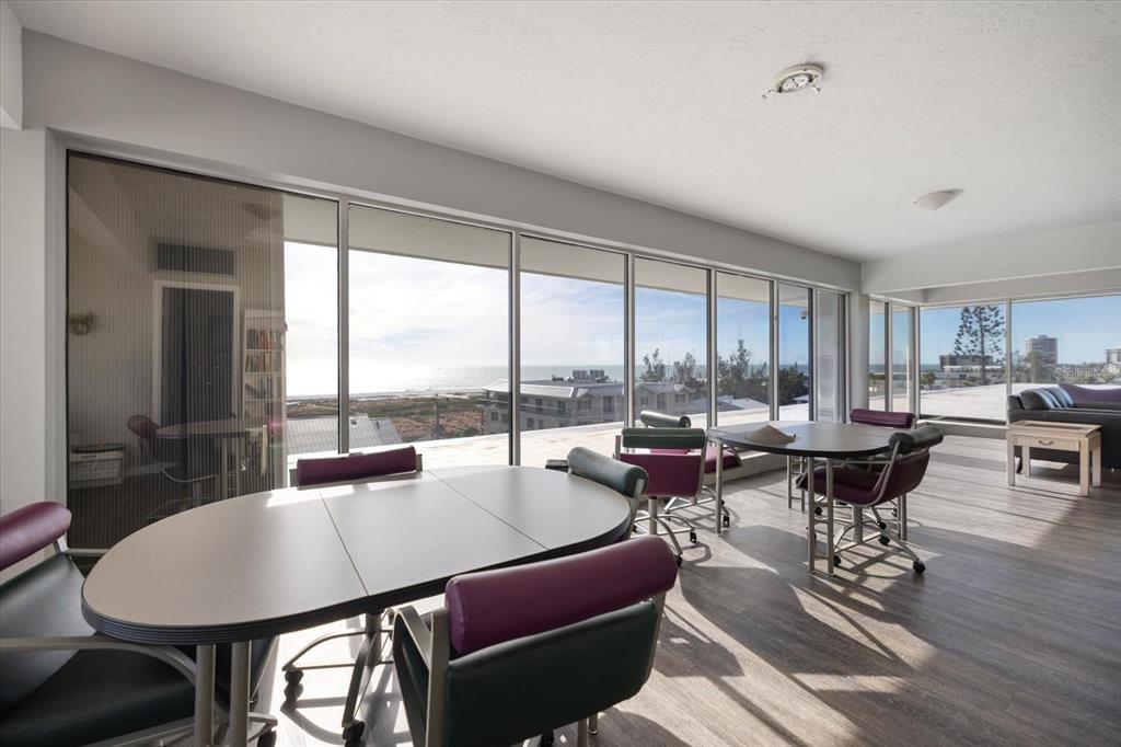 625 Beach Road, Unit 602 Sarasota, FL 34242 - Photo 53 of 65 a living room with lots of furniture and a large window