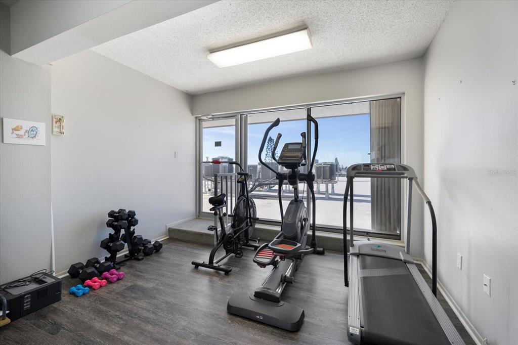 625 Beach Road, Unit 602 Sarasota, FL 34242 - Photo 54 of 65 a view of a room with gym equipment