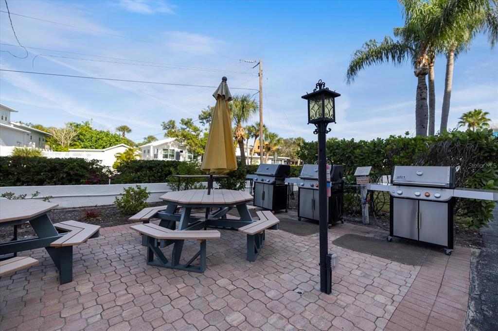 625 Beach Road, Unit 602 Sarasota, FL 34242 - Photo 55 of 65 a view of a backyard with sitting area
