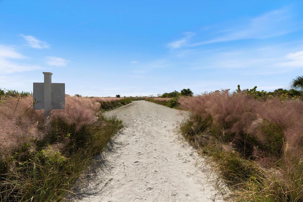 625 Beach Road, Unit 602 Sarasota, FL 34242 - Photo 57 of 65 a view of a dry yard with mountains in the background
