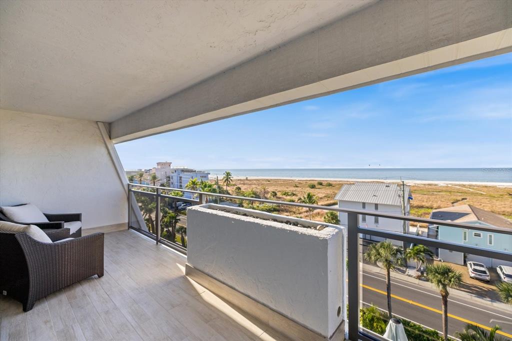 625 Beach Road, Unit 602 Sarasota, FL 34242 - Photo 60 of 65 a view of a balcony with furniture and city view