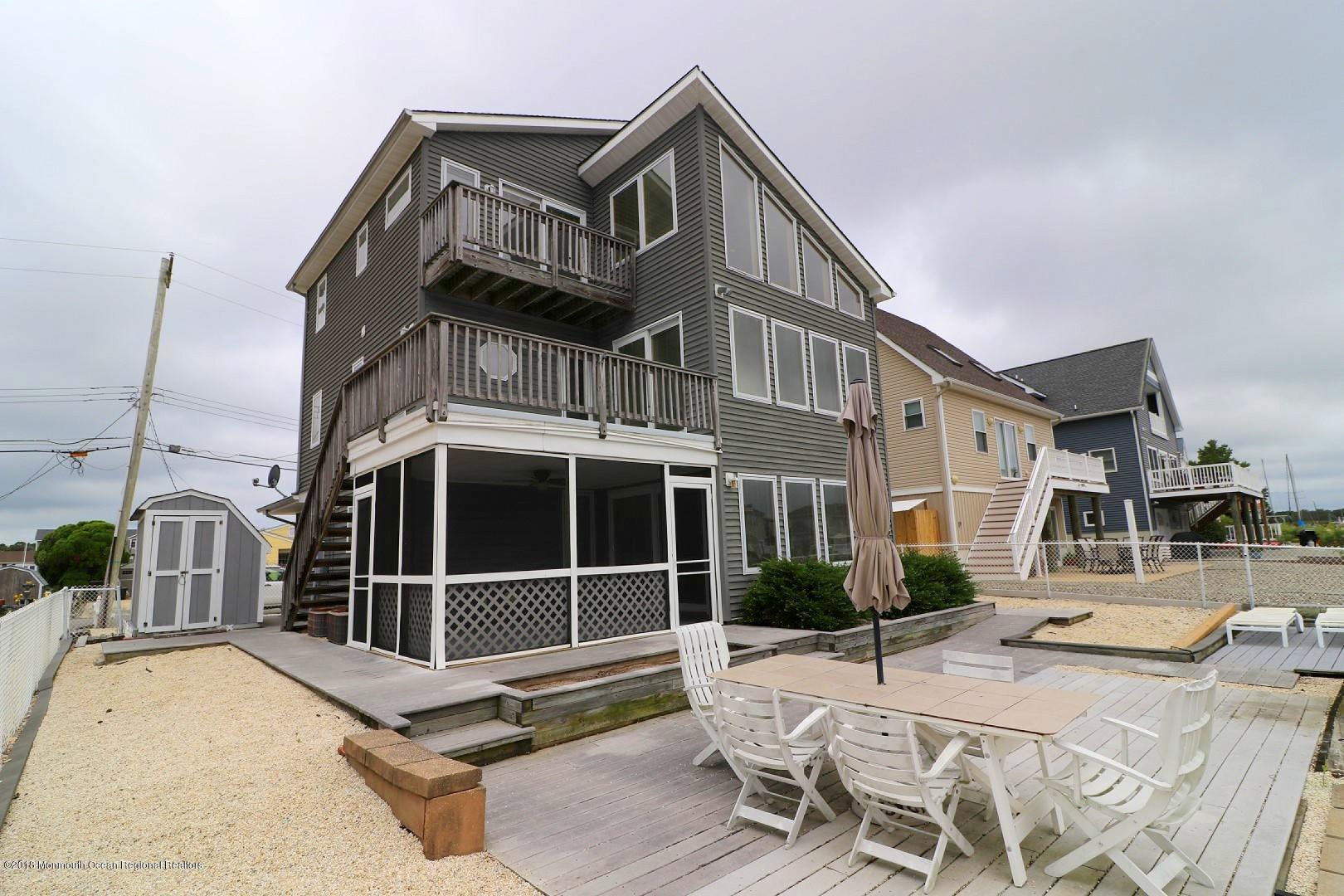 6 Compass Road Waretown, NJ 08758 - Photo 16 of 89 BACK ENCLOSED PATIO