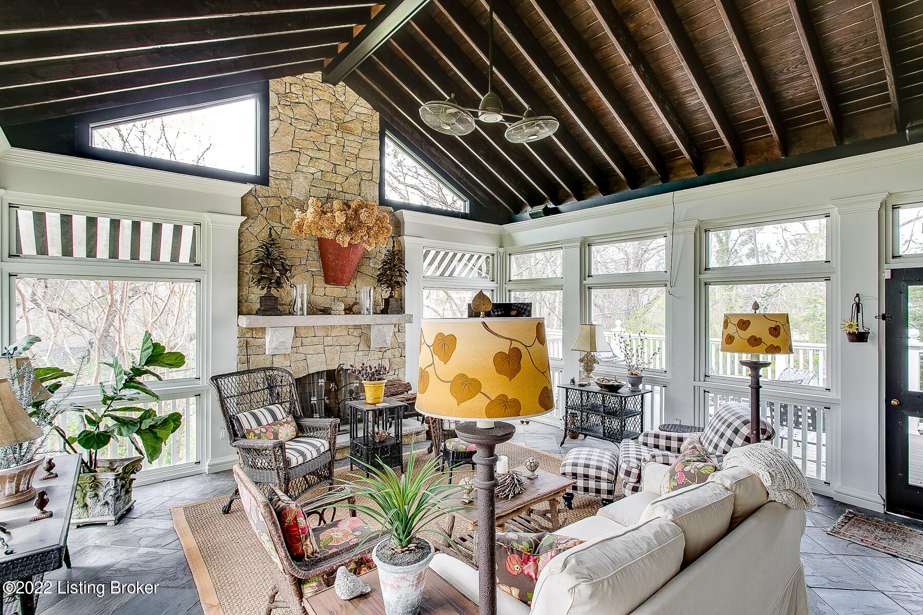 560 Sunset Road Louisville, KY 40206 - Photo 33 of 88 Wow! This room is a show stopper. Over 400 sq ft not included in the total sq ft. The screened porch has custom panels that secure to each opening for almost all year round use.