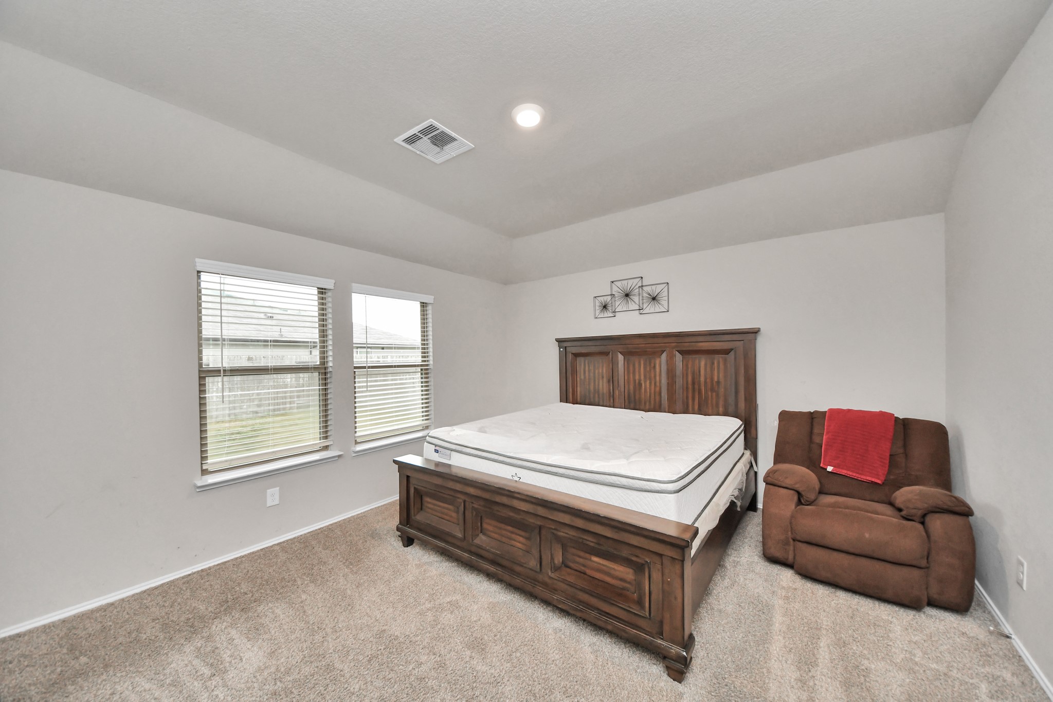 1819 Turtle Bluff Lane Rosenberg, TX 77469 - Photo 15 of 34 Huge primary bedroom offering plenty of space for a large bed and sitting area!