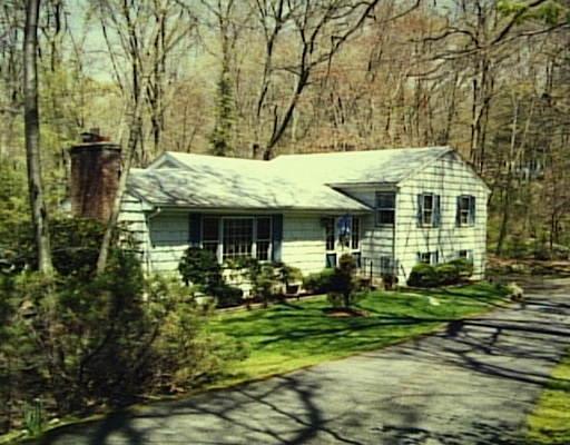 49 Cider Mill Road Stamford, CT 06903 - Photo 1 of 1 front view of a house with a yard