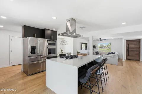 a view of a kitchen and dining room