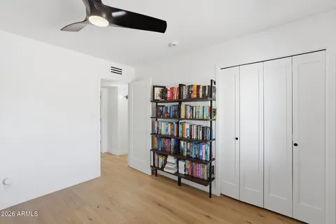 a workspace with furniture hardwood and a window