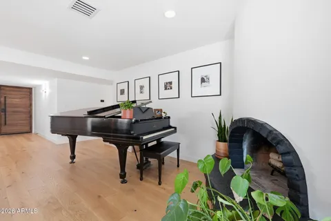 a living room with furniture and a rug