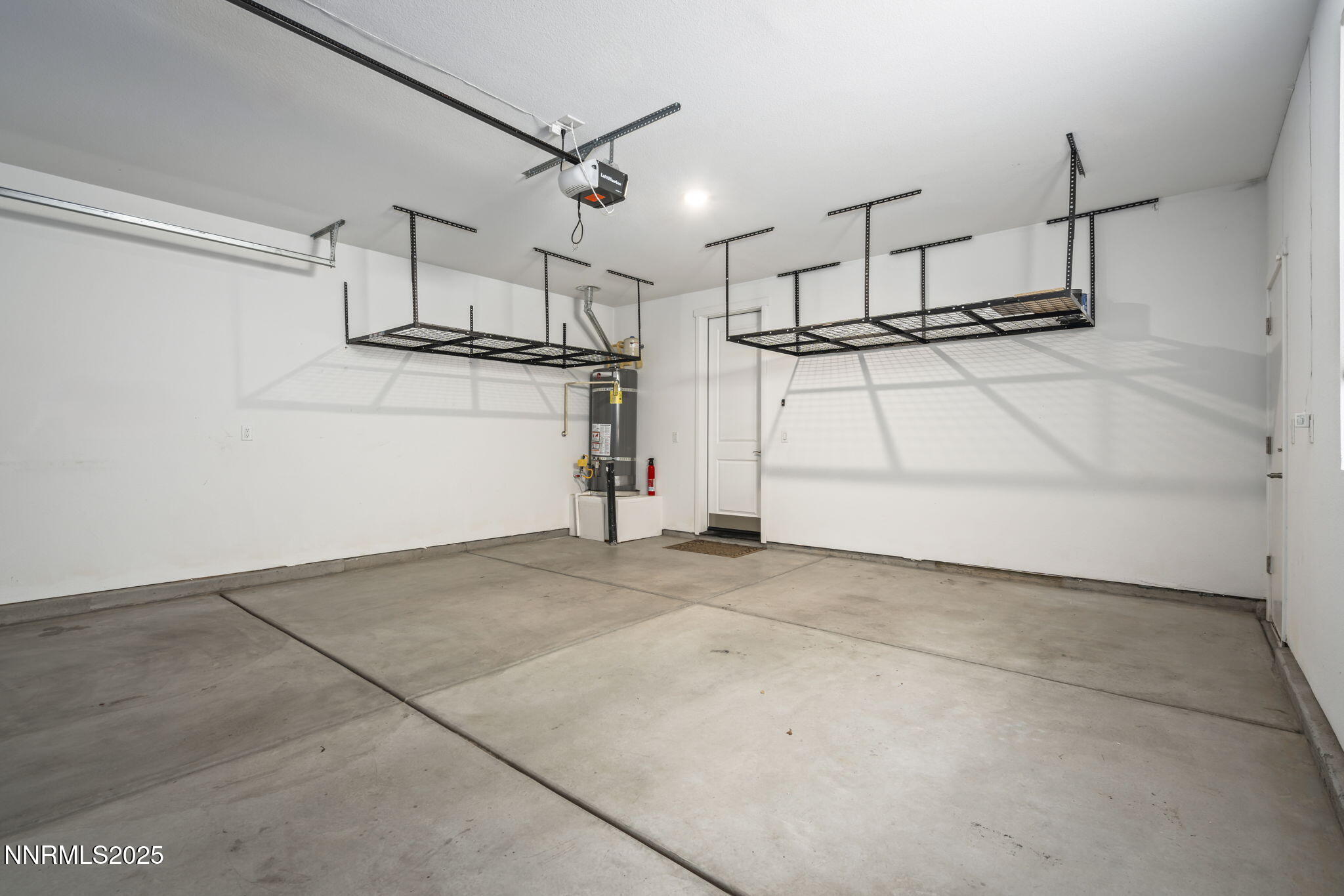 7726 Enclave Key Road Reno, NV 89506 - Photo 11 of 25 a view of a garage