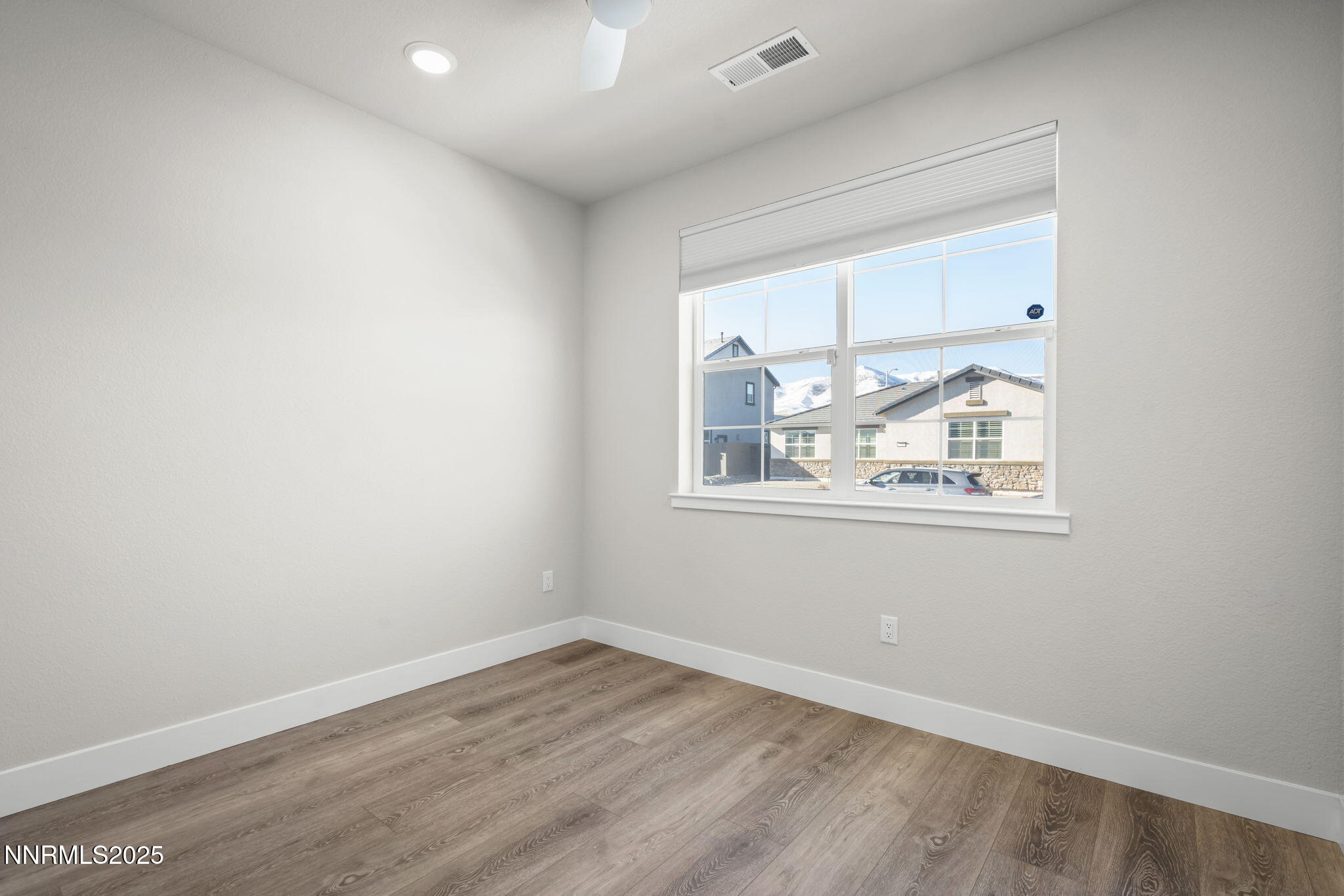 7726 Enclave Key Road Reno, NV 89506 - Photo 13 of 25 an empty room with a window