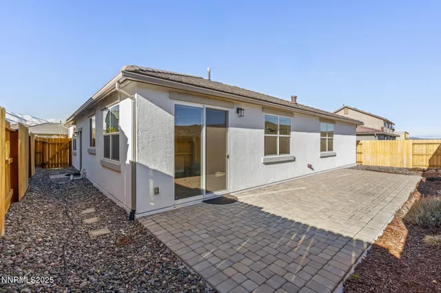 a view of a house with a roof deck