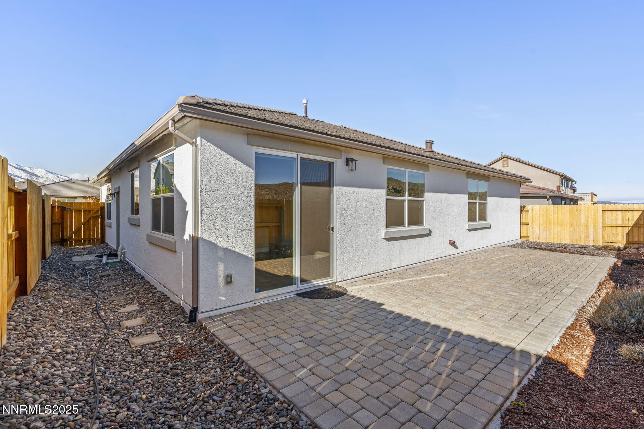 7726 Enclave Key Road Reno, NV 89506 - Photo 24 of 25 a view of a house with a roof deck
