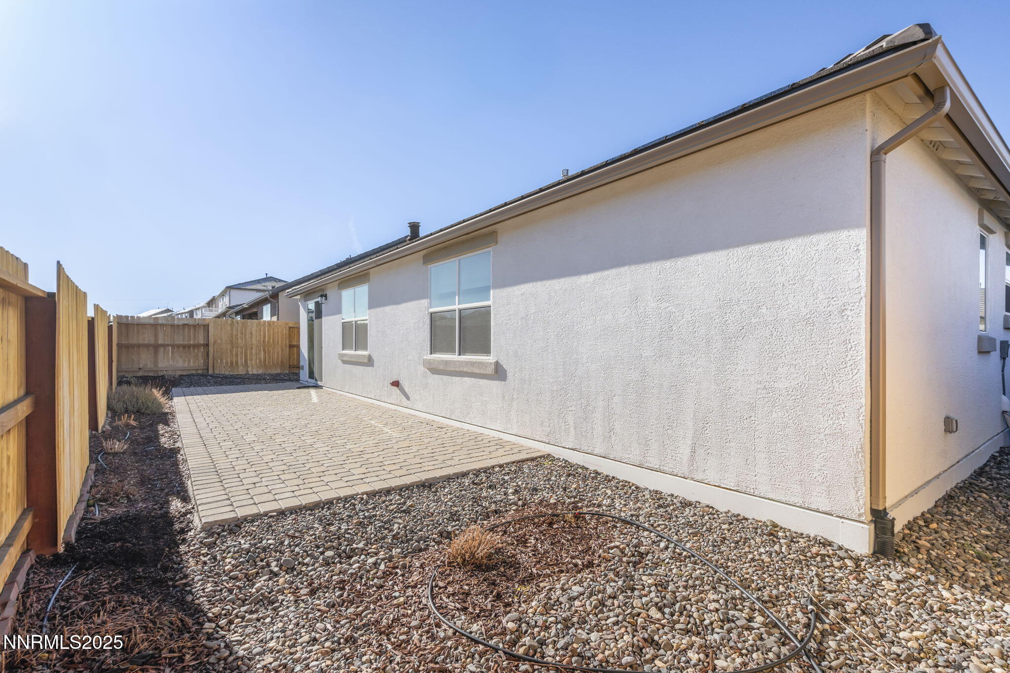 7726 Enclave Key Road Reno, NV 89506 - Photo 25 of 25 a backyard of a house
