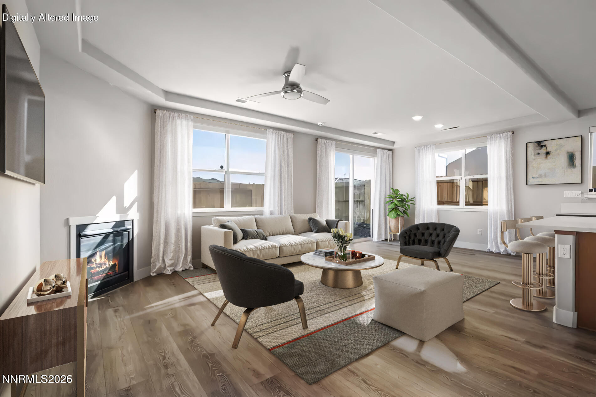 7726 Enclave Key Road Reno, NV 89506 - Photo 3 of 25 a living room with fireplace furniture and a window