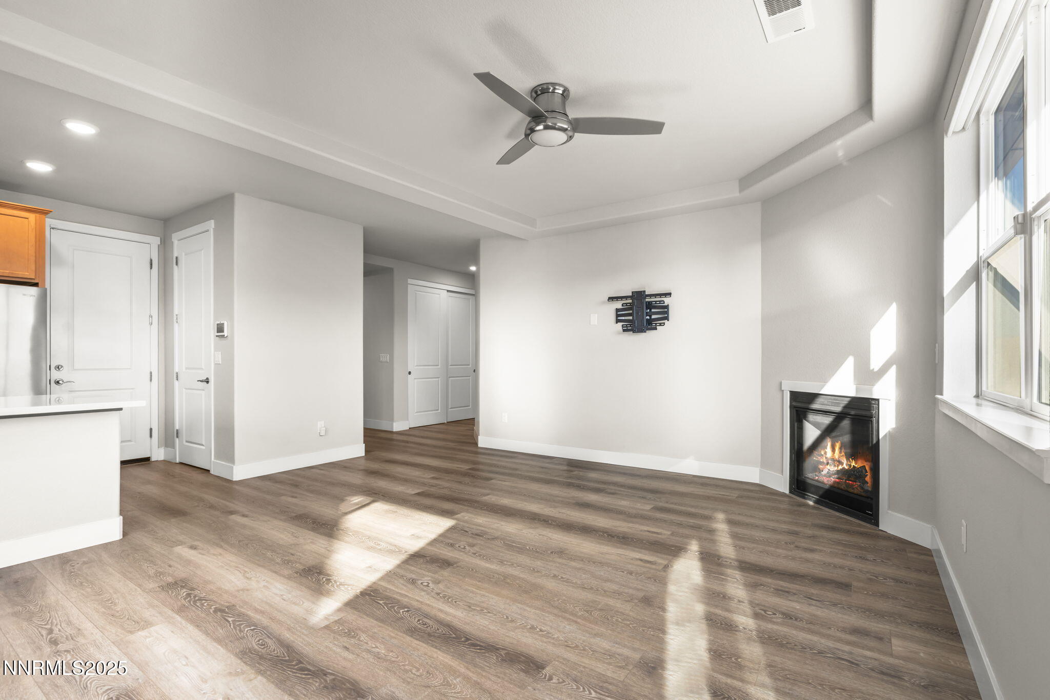 7726 Enclave Key Road Reno, NV 89506 - Photo 5 of 25 a view of an empty room and window