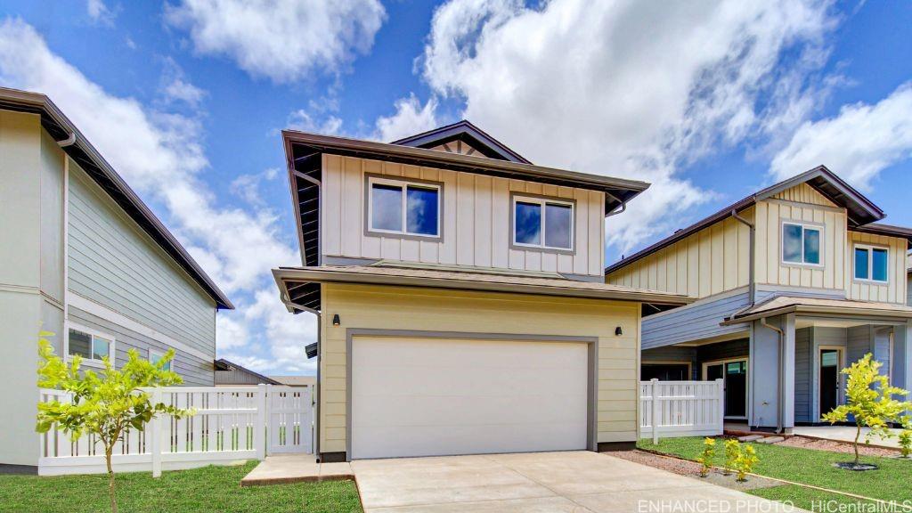 91-4098 Hikuono Street, Unit 43 Kapolei, HI 96707 - Photo 1 of 1 a front view of a house with garden