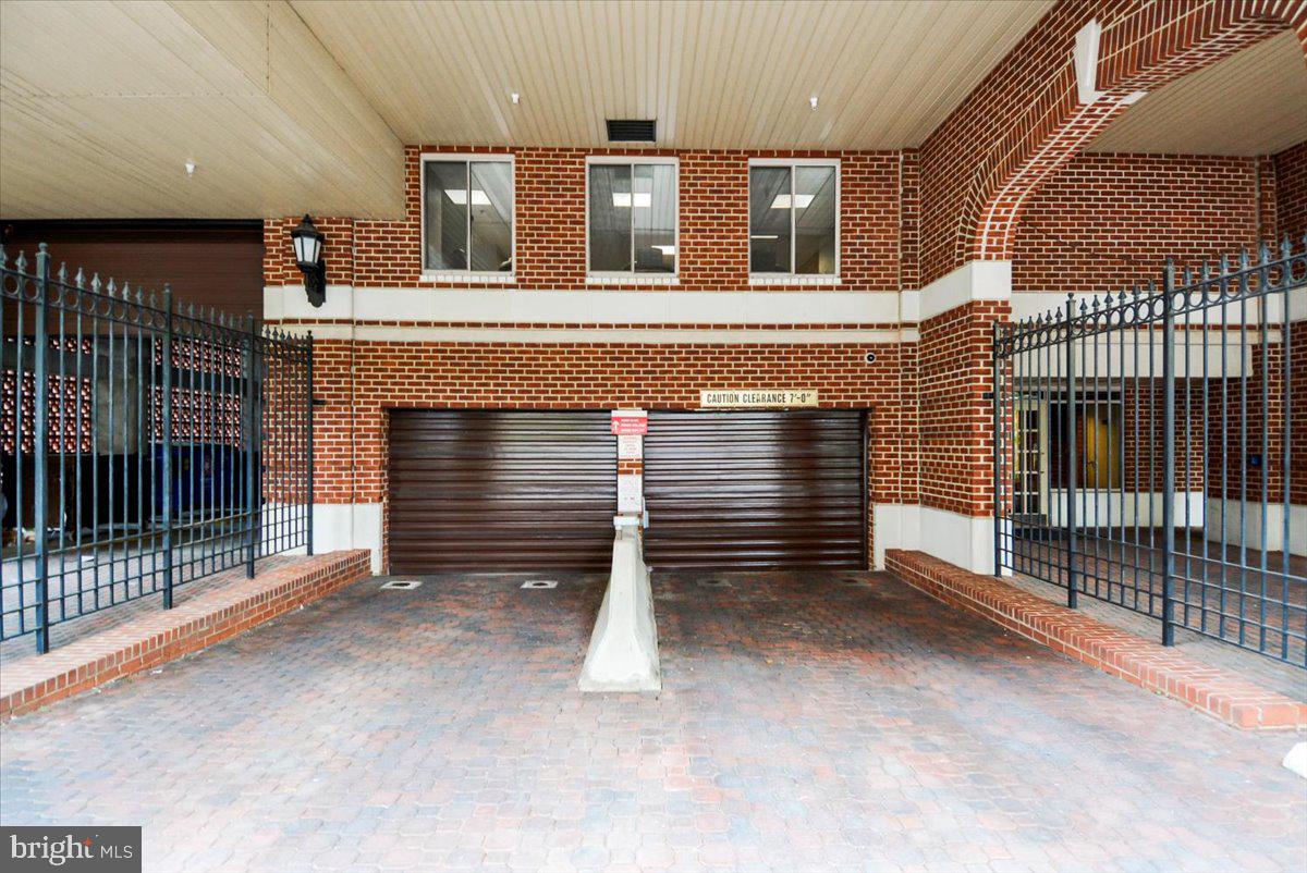 1276 North Wayne Street, Unit 418 Arlington, VA 22201 - Photo 31 of 38 a view of room with garage