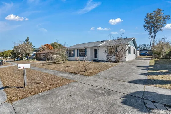 a view of residential houses with street
