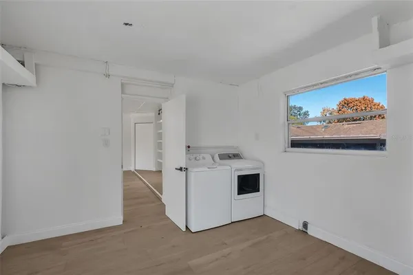 a utility room with washer and dryer