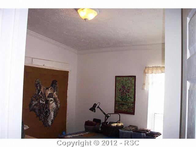 9620 Soap Weed Road Calhan, CO 80808 - Photo 14 of 16 Bedroom Currently Used As Home Crafts Operation...
