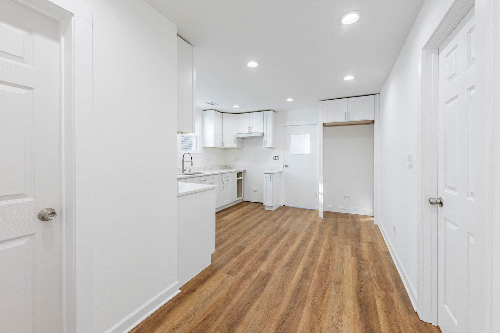 1719 North Merrimac Avenue Chicago, IL 60639 - Photo 19 of 35 a view of kitchen and wooden floor