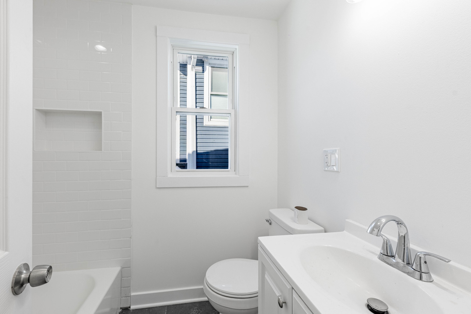1719 North Merrimac Avenue Chicago, IL 60639 - Photo 23 of 35 a bathroom with a sink and a toilet