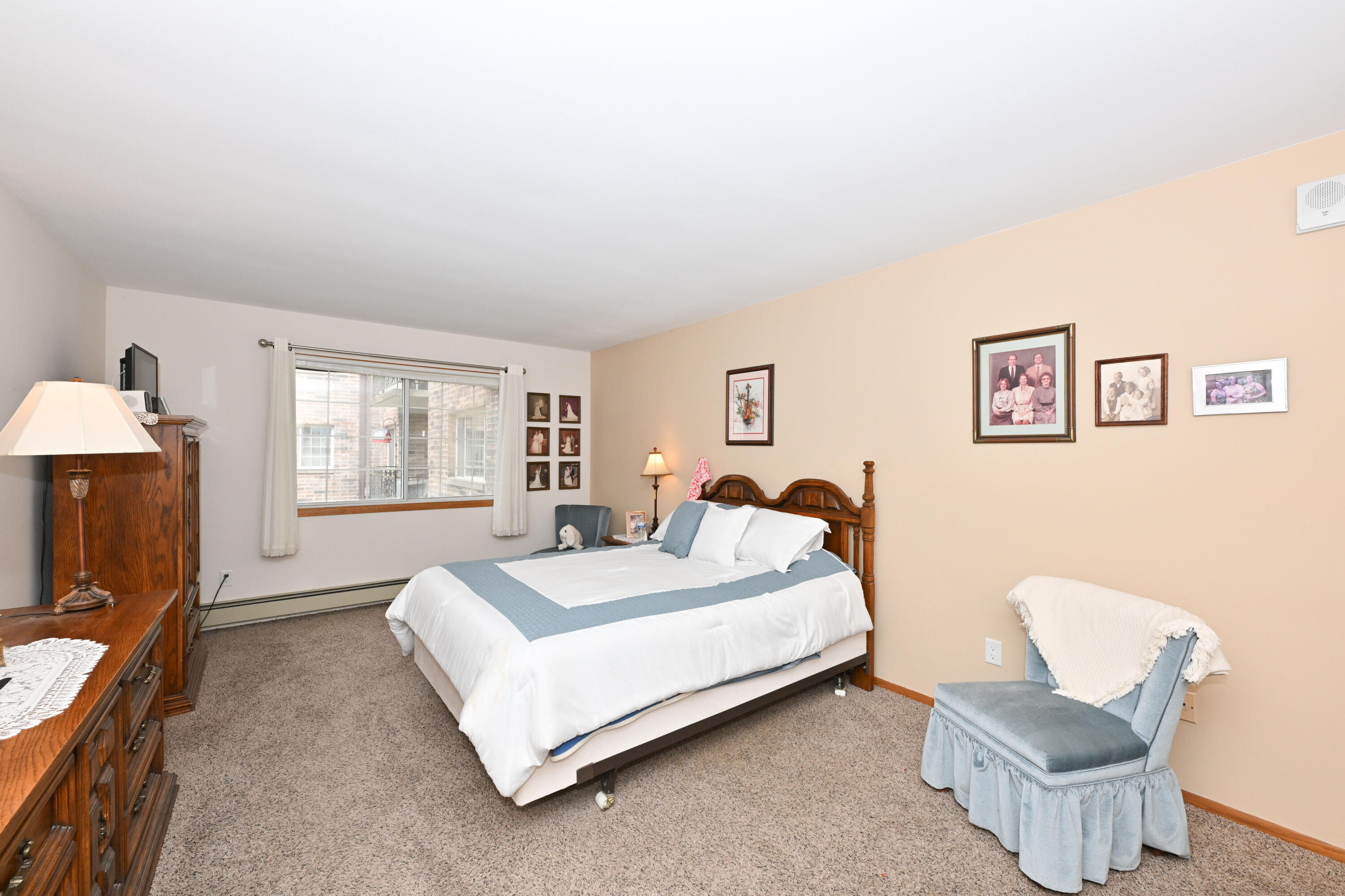1730 West Green Tree Road, Unit 104 Glendale, WI 53209 - Photo 13 of 28 Terrific primary bedroom with massive closet and full bath!