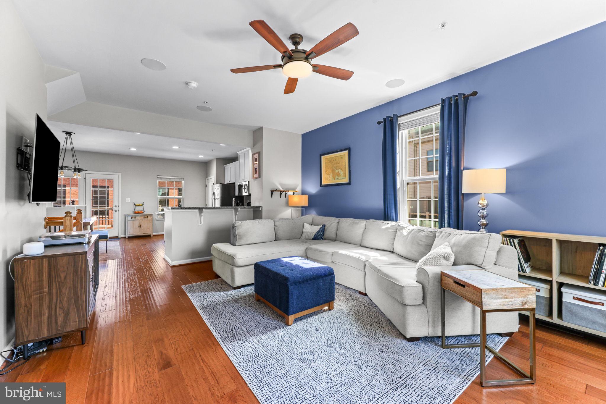 4648 Hudson Street Baltimore, MD 21224 - Photo 20 of 46 a living room with furniture and a wooden floor